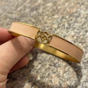 Victoria’s Secret pale pink with gold tone bangle bracelet